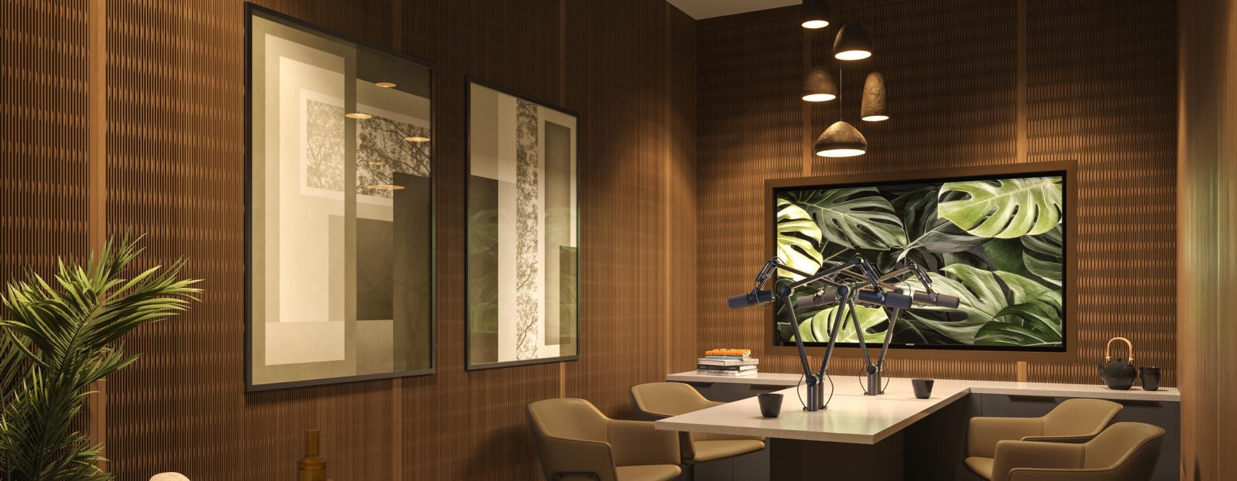a room with a desk and chairs